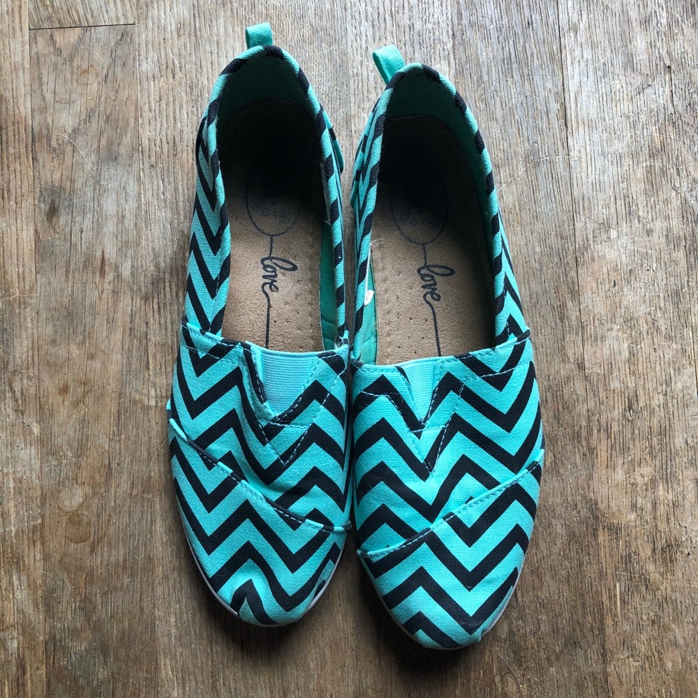 Blue and black chevron striped shoes.